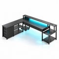 Bureau d'angle en L réversible avec 7 tiroirs, LED, prises et ports USB – Noir